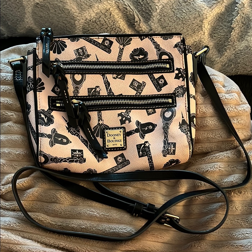 Dooney & Bourke Pink and Black Crossbody Bag with a Key Design